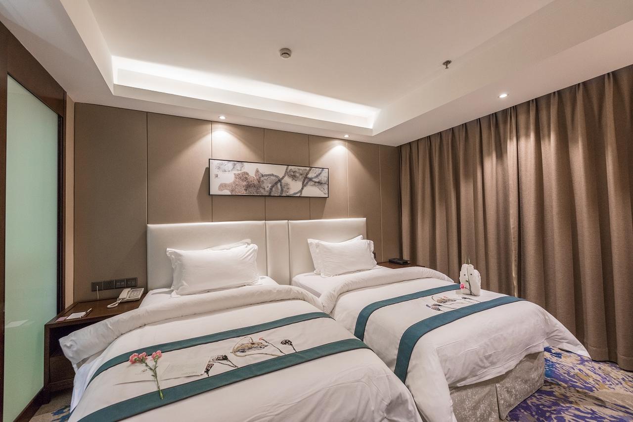 Hotel Metropolo Jinjiang Xuzhou Railway Station Suning Plaza Chudu Extérieur photo